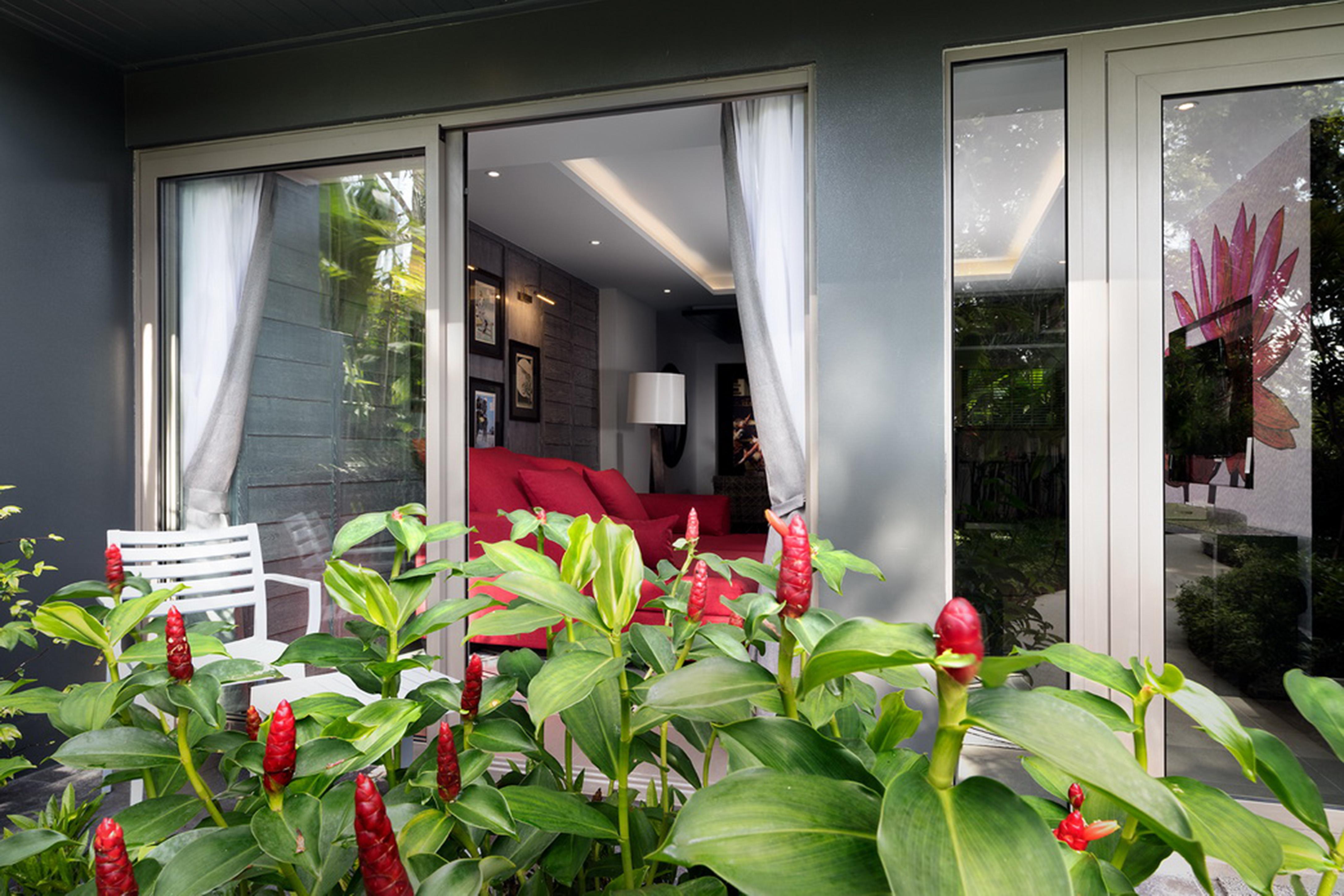 The Pavilions Phuket (Adults Only) Pantai Bang Tao Bagian luar foto A view of the living room from the balcony